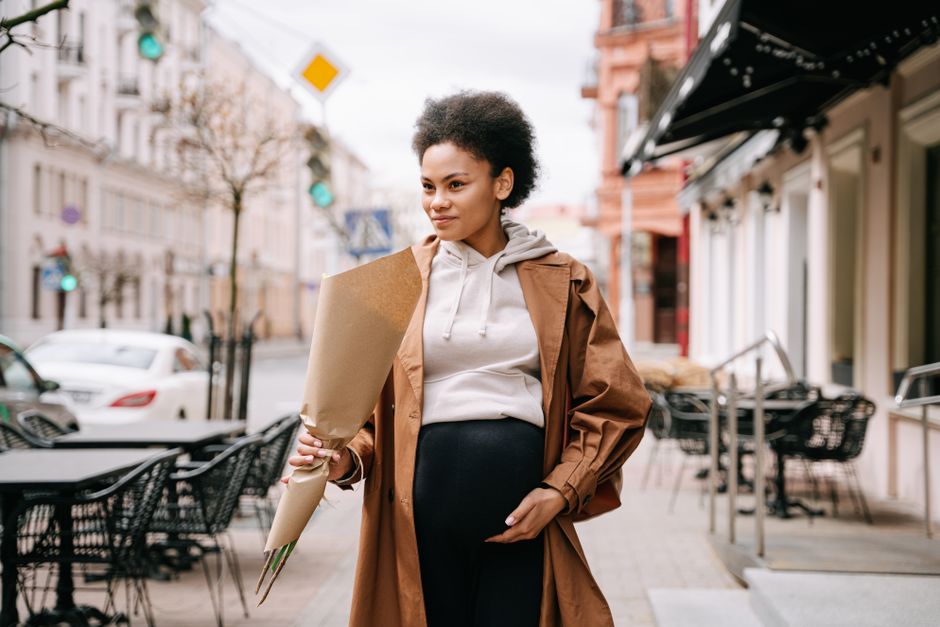 healthy habits for pregnant women - pregnant woman walking outdoors