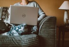 how to start a side hustle with no money - person working laptop home office
