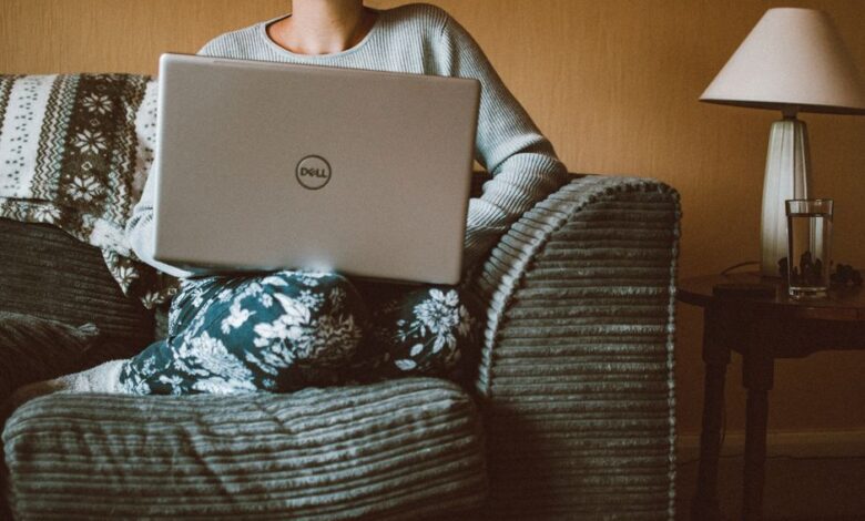 how to start a side hustle with no money - person working laptop home office
