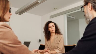 workplace discrimination breastfeeding - professional woman in business meeting