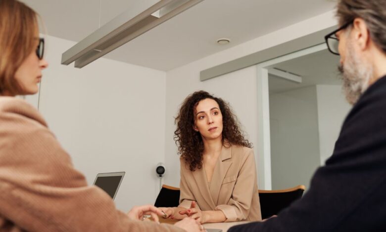 workplace discrimination breastfeeding - professional woman in business meeting